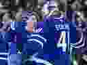 Toronto Maple Leafs' Mitch Marner (left) and goalkeeper Anthony Stolarz celebrated after defeating the Florida Panthers in Toronto on April 2, 2025. The result was that the Maple Leafs won the playoff berth.