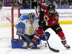 The Ottawa Charge's Alexa Vasko (10) is unable to tip a shot past the Toronto Sceptres' Raygan Kirk.