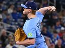 Toronto Blue Jays pitcher Paxton Schultz throws to a Seattle Mariners batter in his major league debut.