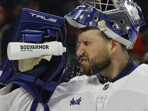 Maple Leafs goalie Anthony Stolarz sprays himself with some water during Game 3 of the first round playoff series against the Senators in Ottawa, April 24, 2025.