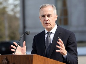 Mark Carney speaks during a news conference.