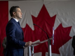 Conservative Party Leader Pierre Poilievre speaks at a press conference during a campaign event on April 14, 2025 at the Holiday Inn & Suites in Montreal.