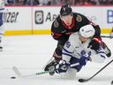 William Nylander gets tackled to the ice by Senators’ Brady Tkachuk in Game 4 at Ottawa on Saturday.