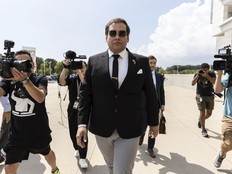 Former U.S. Rep. George Santos arrives at court in Central Islip, N.Y., Aug. 19, 2024.