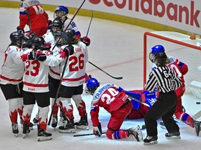 Canadian players celebrate their fifth goal during the IIHF Women's World Championship, Group A, match between Czech Republic and Canada, in Ceske Budejovice, Czech Republic, Monday, April 14, 2025.
