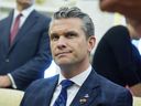 Secretary of Defense Pete Hegseth listens as President Donald Trump meets with Norwegian Prime Minister Jonas Gahr Støre during a bilateral meeting in the Oval Office of the White House, Thursday, April 24, 2025, in Washington.