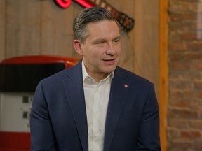 Pierre Poilievre smiles during an interview