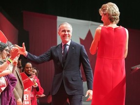 Canadian Prime Minister Mark Carney arrives to address supporters at his campaign headquarters on election night in Ottawa, Tuesday, April 29, 2025. THE CANADIAN PRESS/Nathan Denette