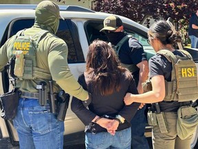 This photo shared by Homeland Security Investigations El Paso on social media shows agents arresting Nancy Cano.