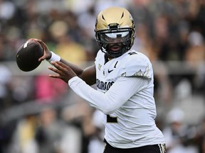 Colorado quarterback Shedeur Sanders throws a pass against Central Florida during the first half of an NCAA college football game, Saturday, Sept. 28, 2024, in Orlando, Fla.
