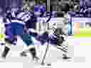 Toronto Maple Leaf Center Steven Lorentz (18) knocked out Nick Perbix (48) from Tampa Bay during the third phase of the NHL hockey game in Tampa, Florida on Wednesday, April 9, 2025.