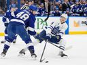 Toronto Maple Leaf Center Steven Lorentz (18) knocked out Nick Perbix (48) from Tampa Bay during the third phase of the NHL hockey game in Tampa, Florida on Wednesday, April 9, 2025.