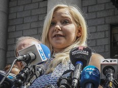 Virginia Roberts Giuffre holds a news conference outside a Manhattan court following the jailhouse death of Jeffrey Epstein, Aug. 27, 2019, in New York City.