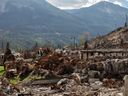 Workers assess, repair and rebuild as residents return to Jasper on Monday, August 19, 2024.
