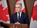 Prime Minister Mark Carney speaks at a news conference about the US tariffs on Parliament Hill in Ottawa on April 3, 2025.