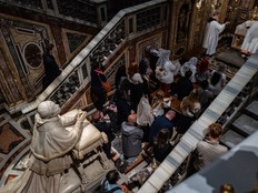 People pray after visiting the tomb of Pope Francis at Santa Maria Maggiore Basilica in Rome on Monday. MUST CREDIT: Salwan Georges/The Washington Post