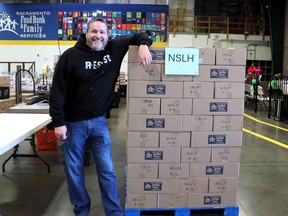 Ruch sorted and boxed food at a Sacramento food bank on April 2. CREDIT: Courtesy of Doug Ruch