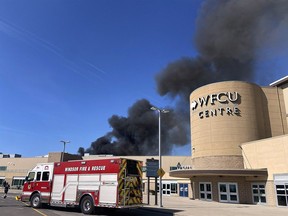 Smoke billows from the roof of the WFCU Centre in Windsor on Monday, April 28, 2025.