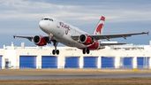 An Air Canada Rouge Airbus A319 jet takes off from Montréal-Pierre Elliott Trudeau International Airport in Montreal Monday December 30, 2024.