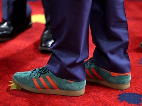 Close -Up Green and Orange Shoes Justin Trudeau。