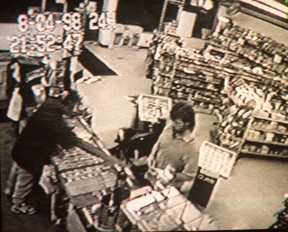 Store surveillance video showed undercover cop Bill Hancox buying a candy bar and pop at a convenience store minutes before he was fatally stabbed by Rose Cece and Barbara Taylor on Aug. 4, 1998.