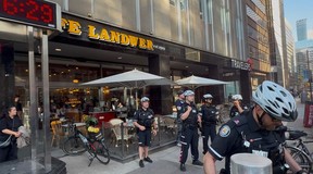A Palestinian protest, in the context of a Nakba Day demonstration, passed by Cafe Landwer at University Ave. and Adelaide St. W. with protesters calling for a boycott of the Israeli restaurant chain and one protestor setting off a smoke bomb outside the restaurant on Thursday, May 15, 2025.