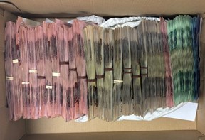 Shamar Campbell, 26, of Toronto, faces charges after drugs were allegedly seized, along with more than $143,000 in cash (seen here), from a home and vehicle in North York on Wednesday, May 14, 2025.