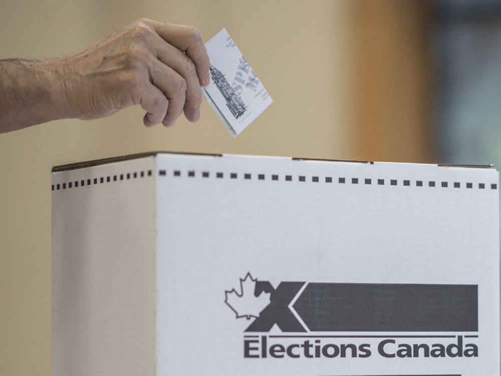 An elector casts a ballot in the 2025 federal election.