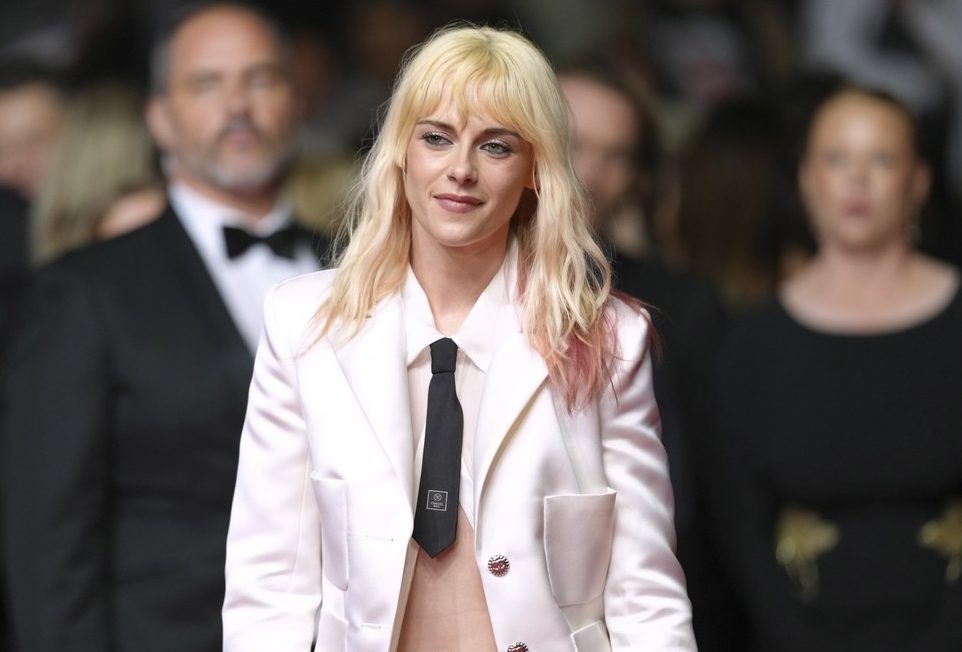  Kristen Stewart poses for photographers at the Cannes Film Festival.