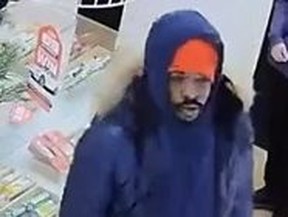 Suspect sought in a retail robbery. TORONTO POLICE HANDOUT