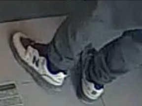 White shoes worn by a robbery suspect.