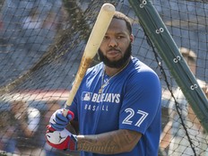 Toronto Blue Jays' Vladimir Guerrero Jr. waits for his turn in the batting cage before a game against the Cleveland Guardians.