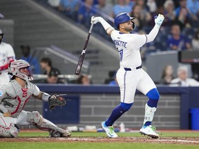 Bo Bichette of the Toronto Blue Jays hits a two-run home run.