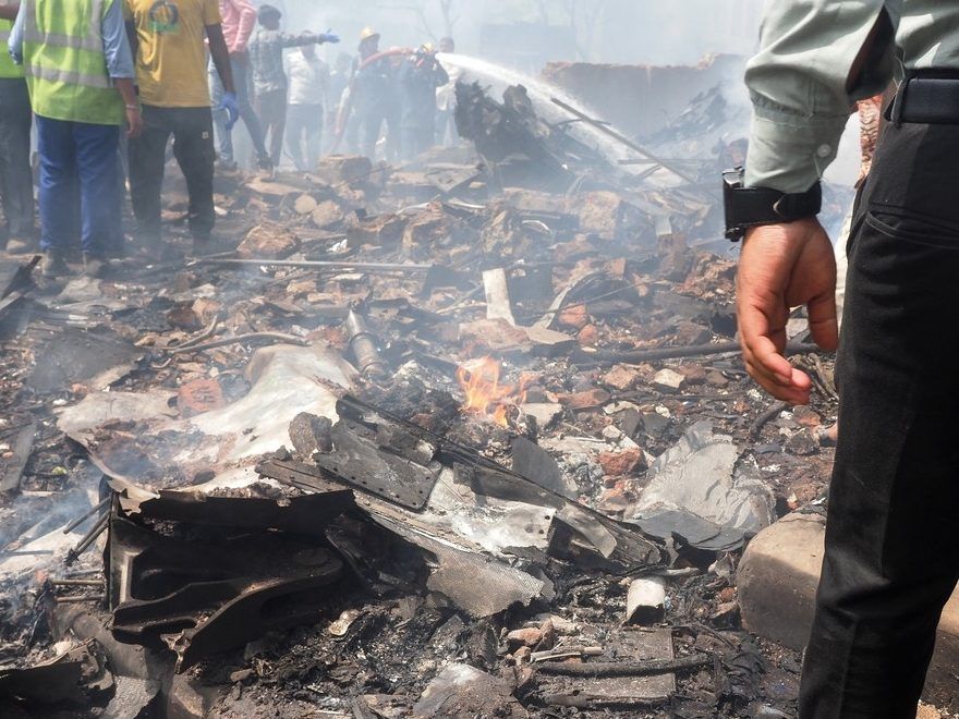 Debris is seen at the site where Air India flight 171 crashed in a residential area near the airport in Ahmedabad on June 12, 2025.  