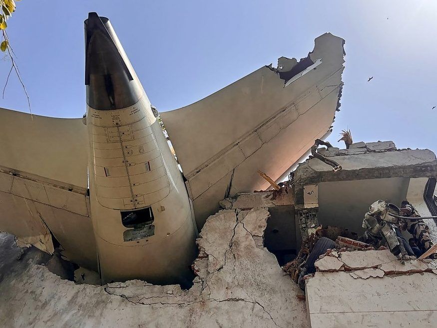 This handout taken and posted on the X (formerly Twitter) account of the Central Industrial Security Force (CISF) On June 12, 2025 shows the back of AN Air India plane after it crashed in a residential area near the airport in Ahmedabad. The London-bound Air India flight 171 passenger plane crashed on June 12 in India's western city of Ahmedabad with 242 on board, aviation officials said in what the airline called a 
