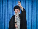 A handout picture provided by the Iranian supreme leader Ayatollah Ali Khamenei's office shows him waving during a ceremony on the occasion of 36rd death anniversary of Ayatollah Ruhollah Khomeini, in Tehran on June 4, 2025.