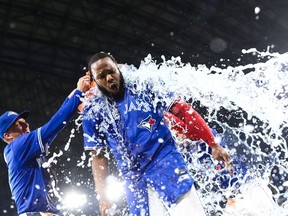 Vladimir Guerrero Jr. of the Toronto Blue Jays gets an ice bath.