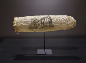 This image made available by the Rijksmueum shows a condom with print, circa 1830, which has gone on display at Amsterdam's Rijksmuseum.