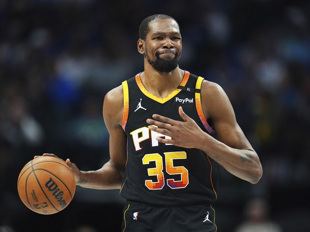 Phoenix Suns forward Kevin Durant gestures during the second half of an NBA basketball game on March 9, 2025, in Dallas.