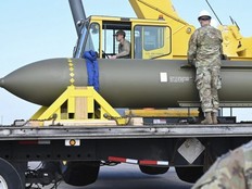 In this file photo released by the U.S. Air Force on May 2, 2023, airmen look at a GBU-57, or the Massive Ordnance Penetrator bomb, at Whiteman Air Base in Missouri.