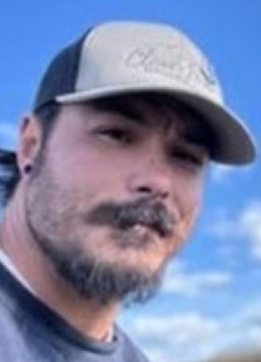 Travis Decker is wanted by authorities in Washington state after his three daughters were found dead.