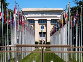 Flagpoles line in rows in front of a building of the United Nations in Geneva, Switzerland, June 14, 2021.