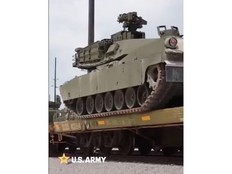 An Army video of tanks headed to D.C. for a June 14 parade appears to show 'hang Fauci and Bill Gates' graffiti. MUST CREDIT: U.S. Army