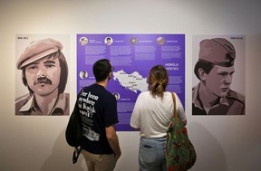 The heroics of Bosnian Croat ‘Neđo’ Galic (L) and Bosnian Serb Srdan Aleksic, who tried to save their neighbours, are featured in the exhibition. OLIVER BUNIC/AFP