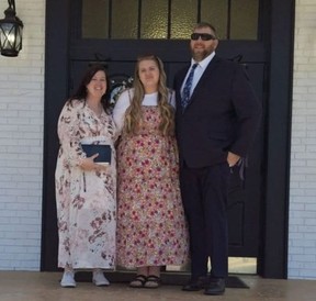 Kristen Davis, left, with her husband, Josh Davis, and their 14-year-old daughter, Hannah Davis.