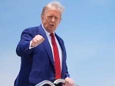 President Donald Trump gestures as he boards Air Force One at Joint Base Andrews, Md., Friday, June 20, 2025.