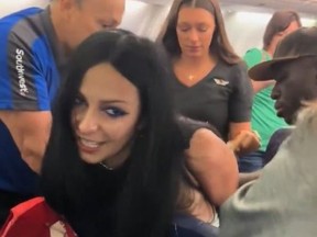 Leanna Perry, arrested and charged with aggravated assault after grabbing womans hair on flight in violent meltdown.