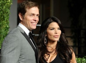 Lauren Sanchez arrives at the 2011 Vanity Fair Oscar party with then husband Hollywood executive Patrick WhitesellPASCAL LE SEGRETAIN/GETTY IMAGES NORTH AMERICA/AFP