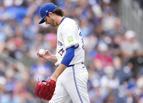 Blue Jays starter Kevin Gausman reacts against the Arizona Diamondbacks during the fifth inning at Rogers Centre on June 19, 2025 in Toronto. MARK BLINCH/GETTY IMAGES