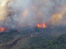 This May 29, 2025, aerial image courtesy of the Manitoba Government, shows wildfires burning in the Nopiming Provincial Park in the area of Bird River, Man.